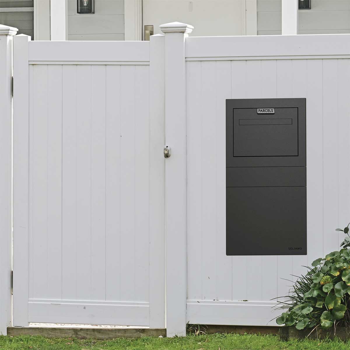 Nest letterbox installed to the fence